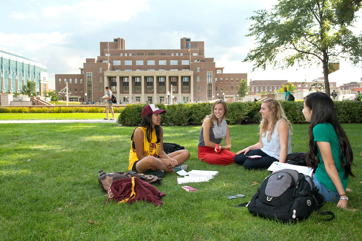 Students studying on Northrop Mall